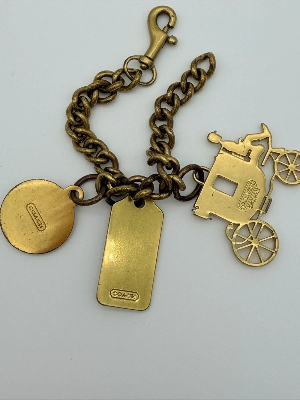 COACH Brass Charm Bracelet with Coach Tags & Horse Carriage Charm